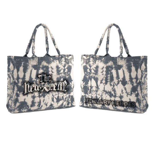 Two tie-dye tote bags with text 